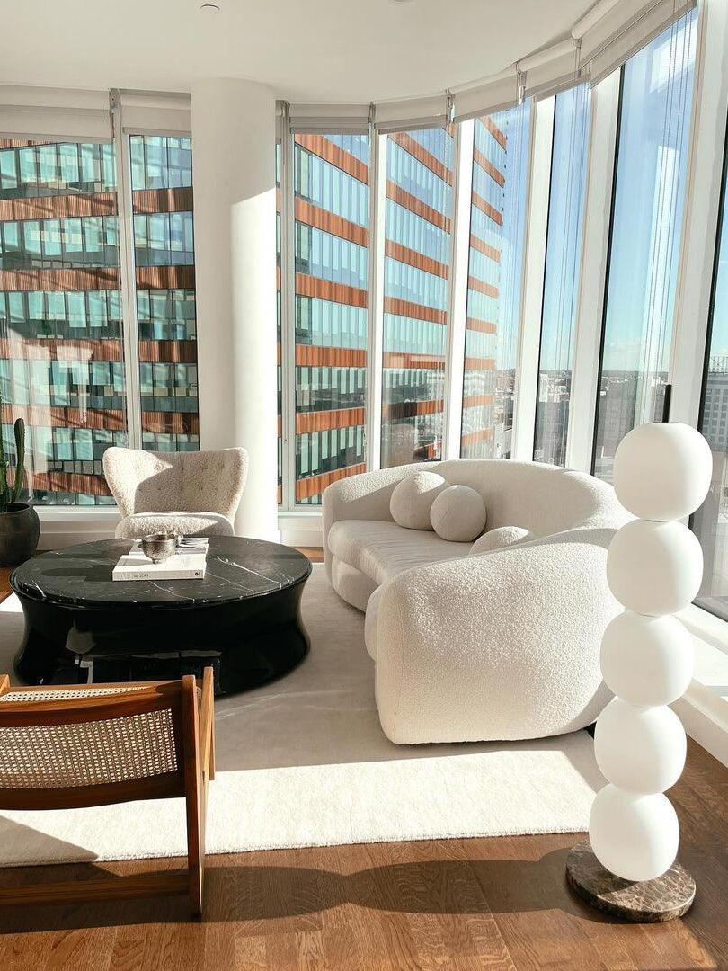 White globe column in sunlit living room