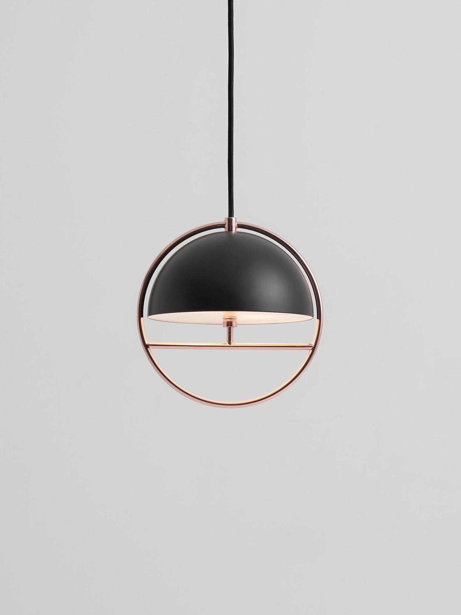 Black half-dome and rose-gold ring pendant