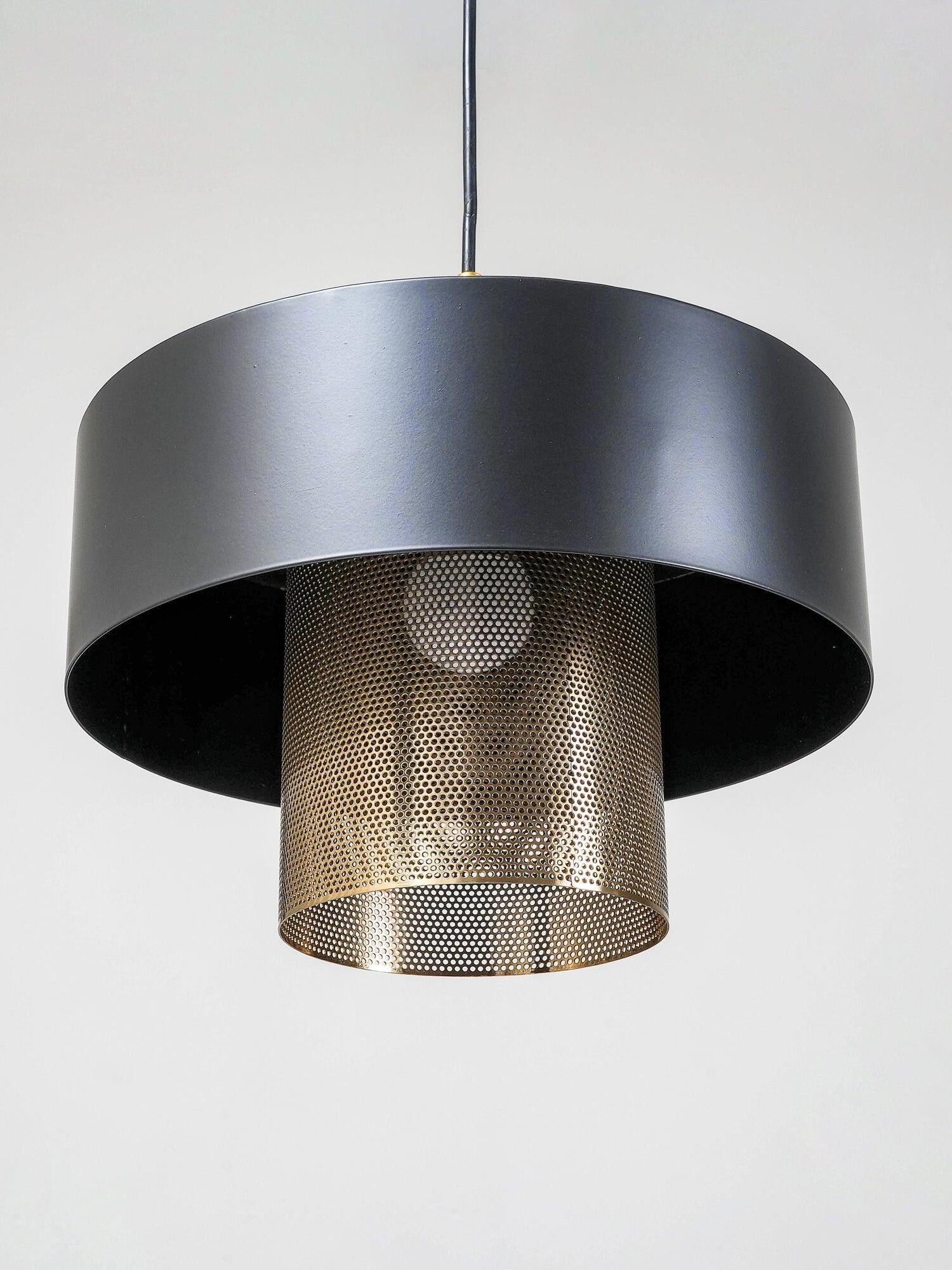 Unlit underside view of Bradbury black outer shade and perforated inner cylinder with visible bulb