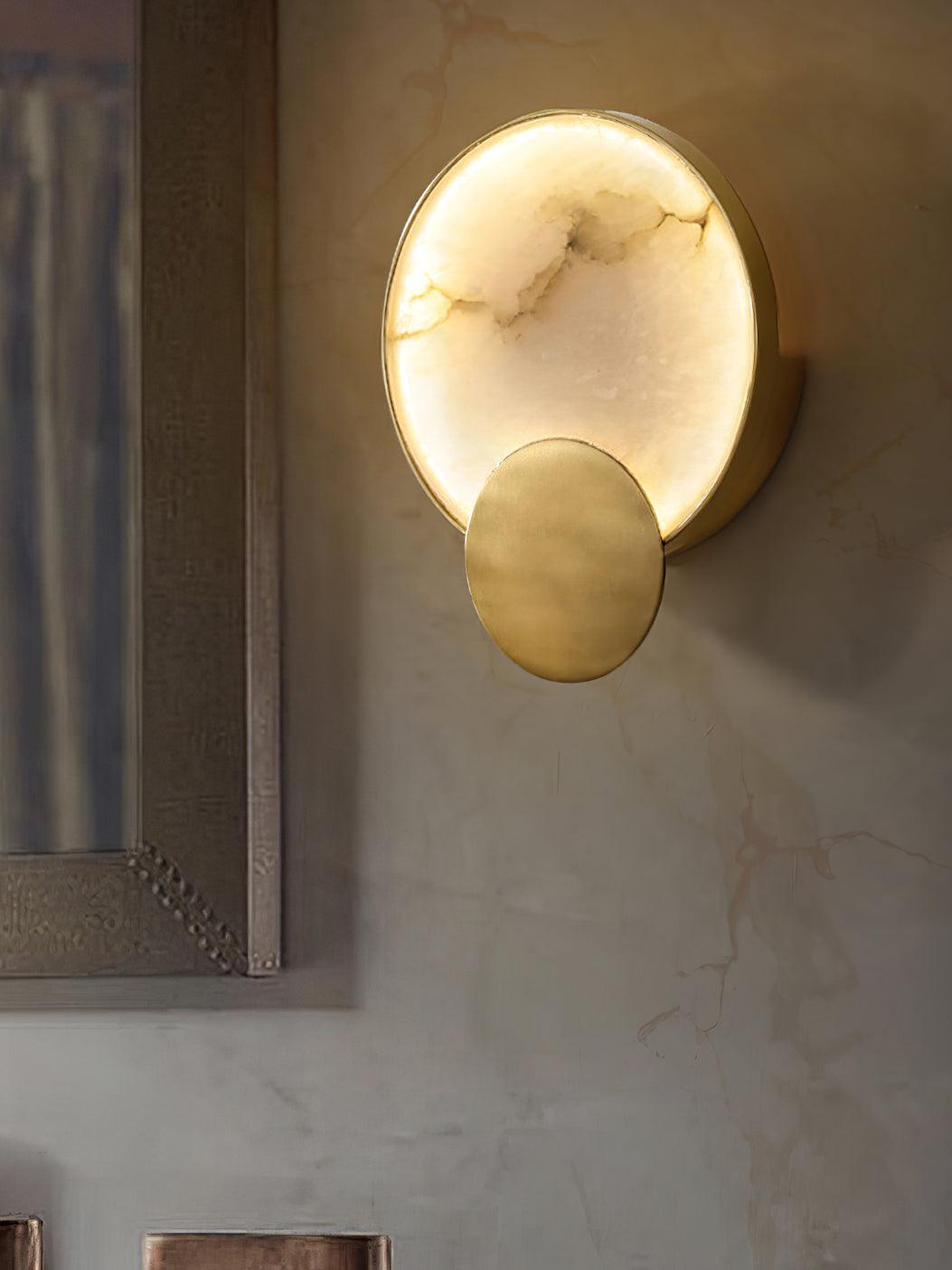 Terra Svet wall light beside a mirror edge