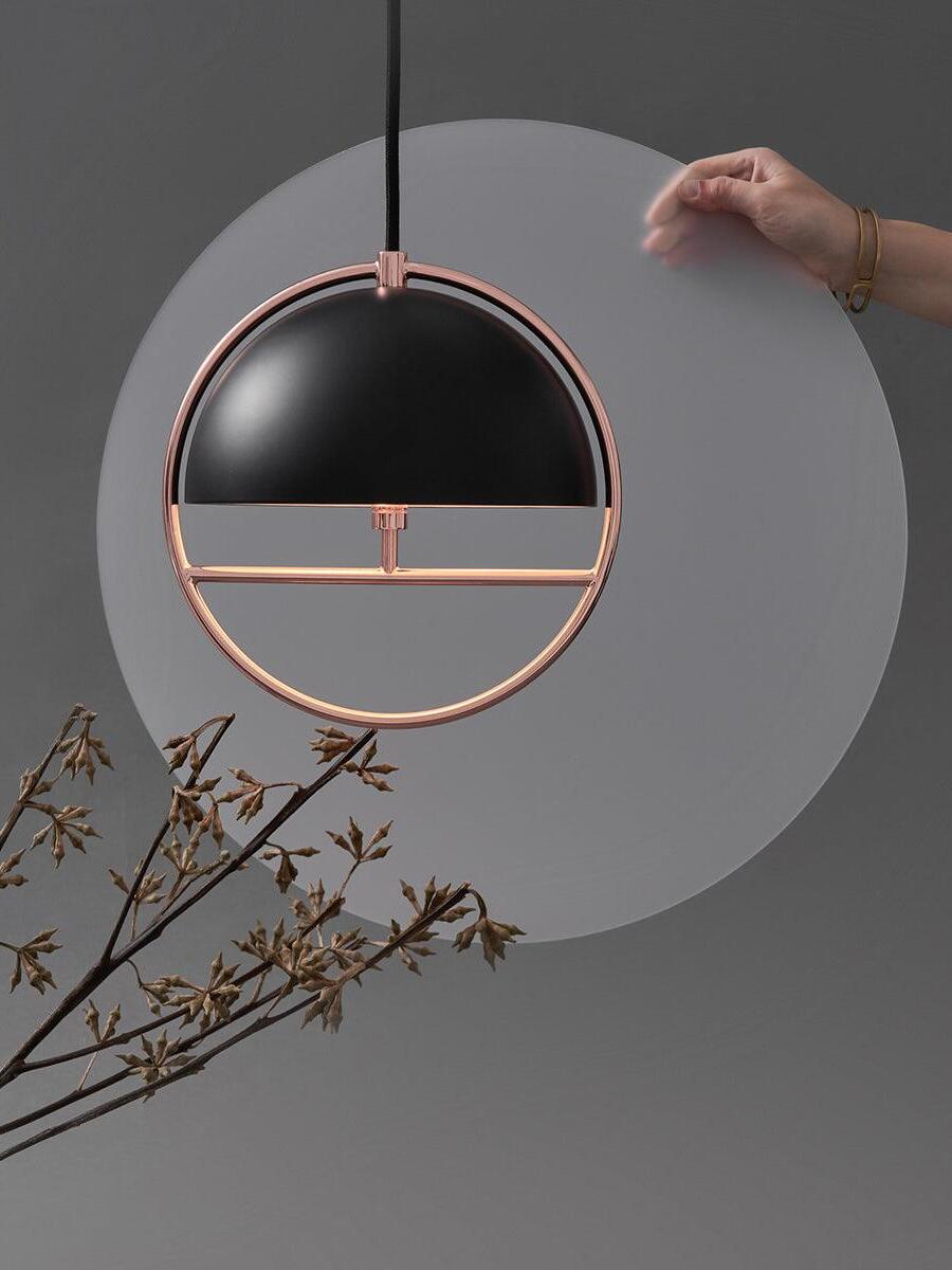 Black dome with rose-colour circular frame