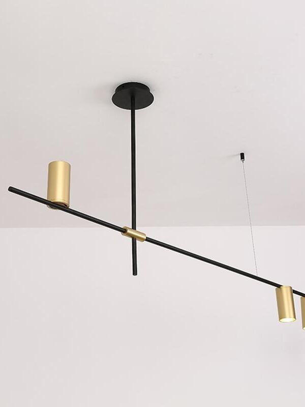 Single black bar with gold-coloured heads and round canopy