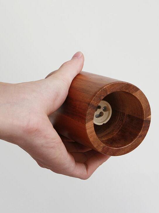 Open wood shade showing bulb socket