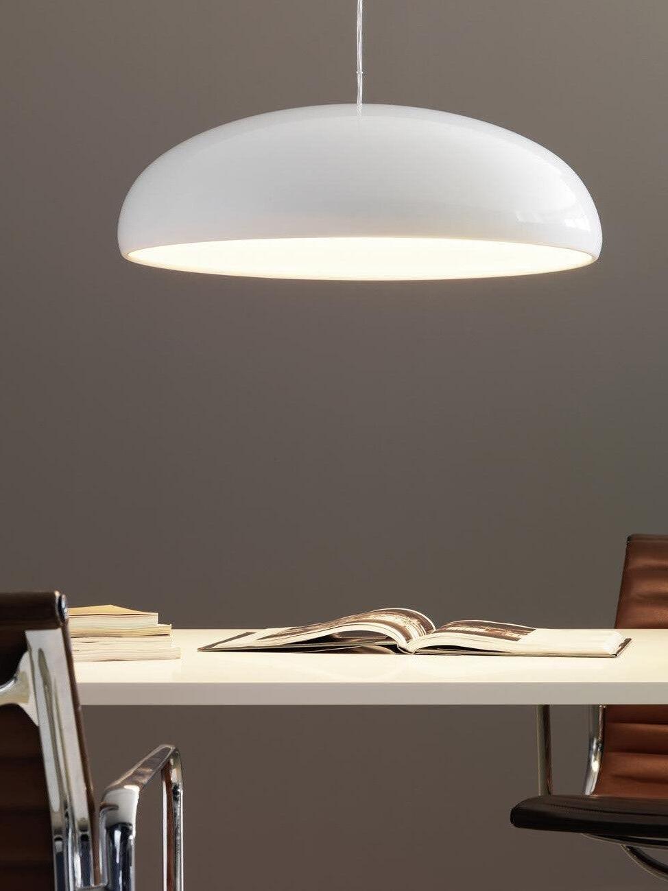 White dome above a desk with an open book