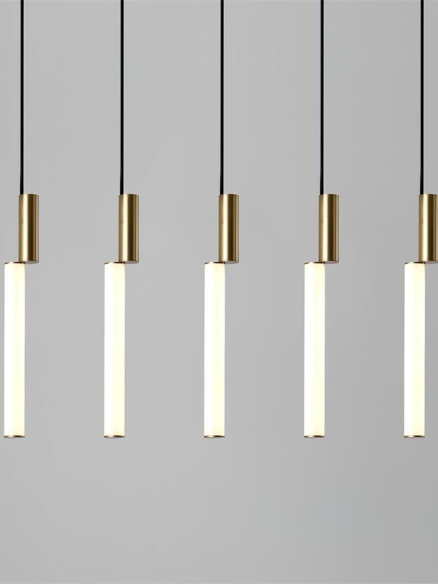 Five gold-top luminous rods below straight ceiling bar