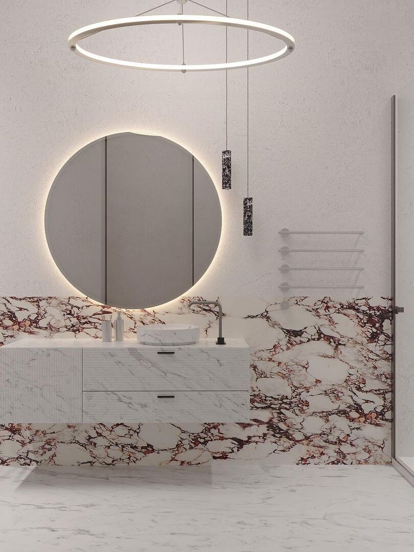 Single ring pendant above vanity and round mirror