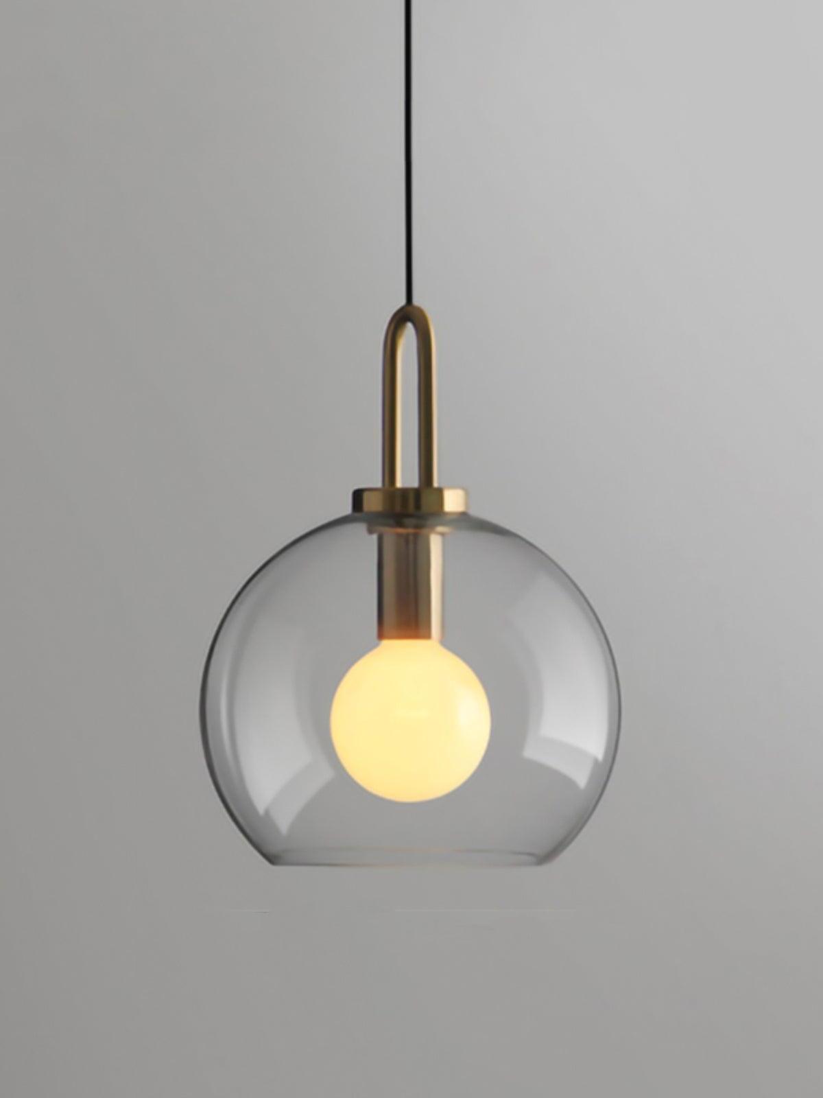 Clear glass globe pendant with an open lower edge and tall metal loop