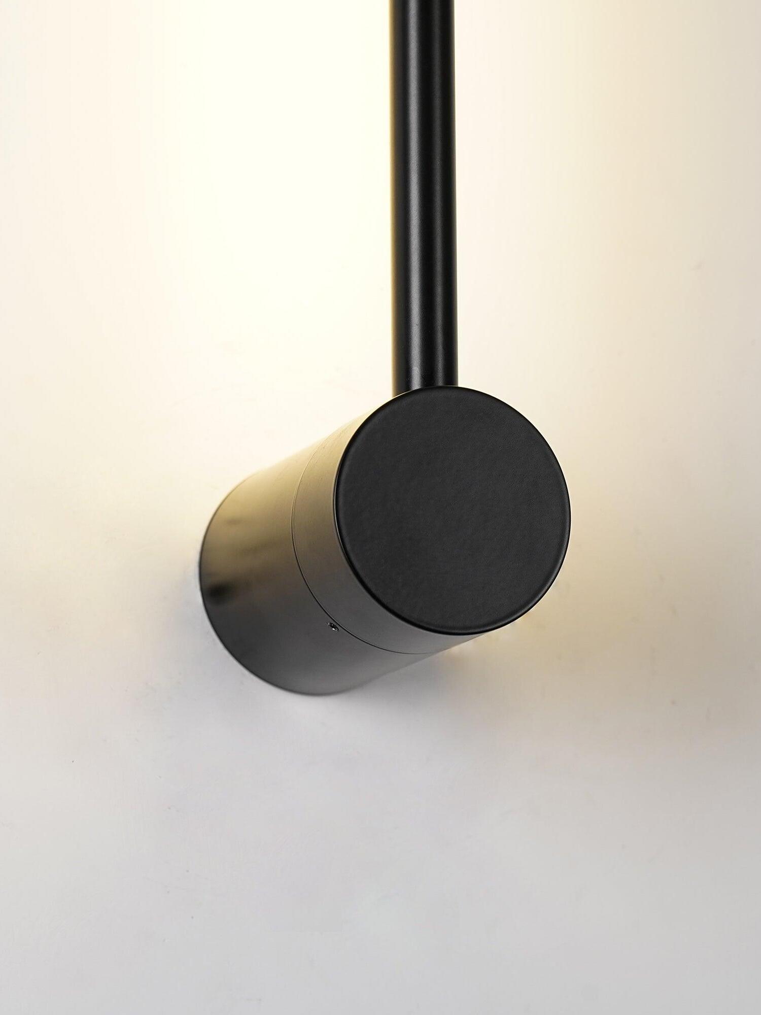 Lit rod above a round-ended black mounting body