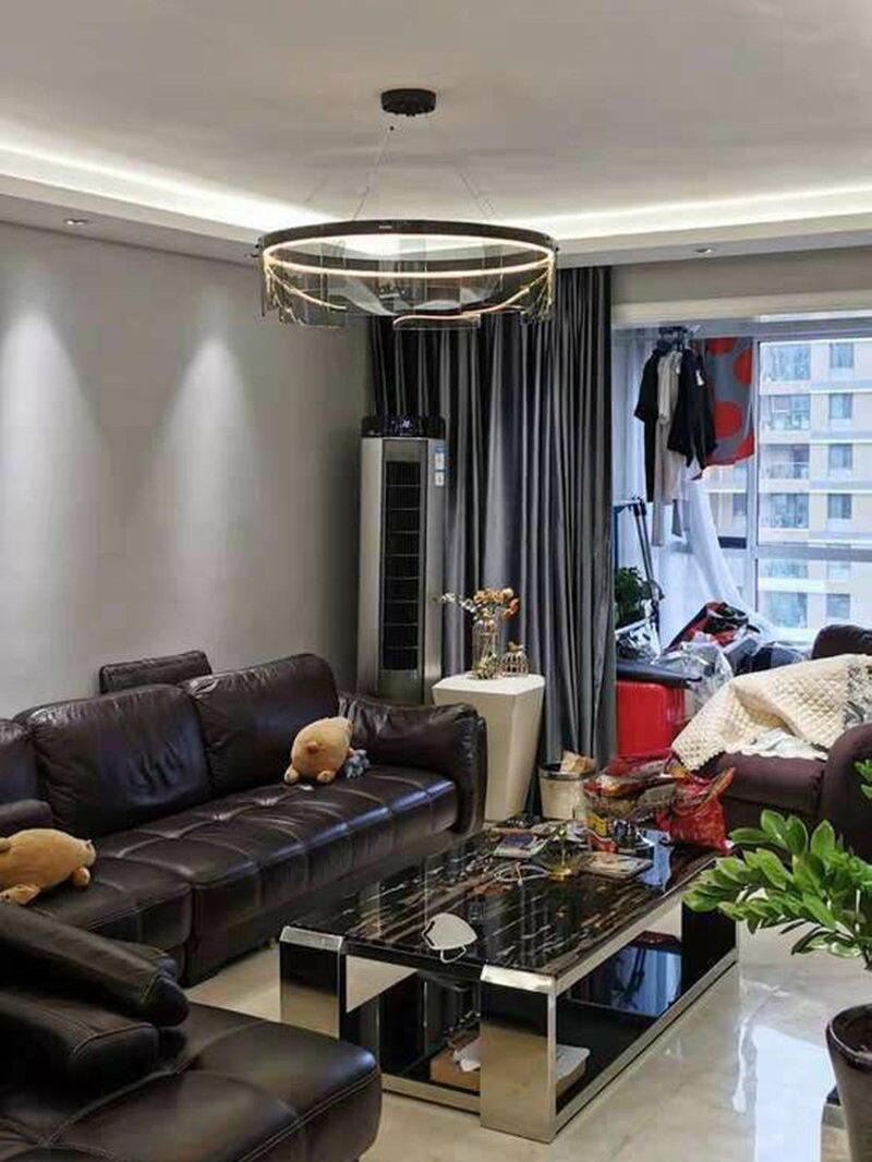 Illuminated Stratos ring in a furnished lounge