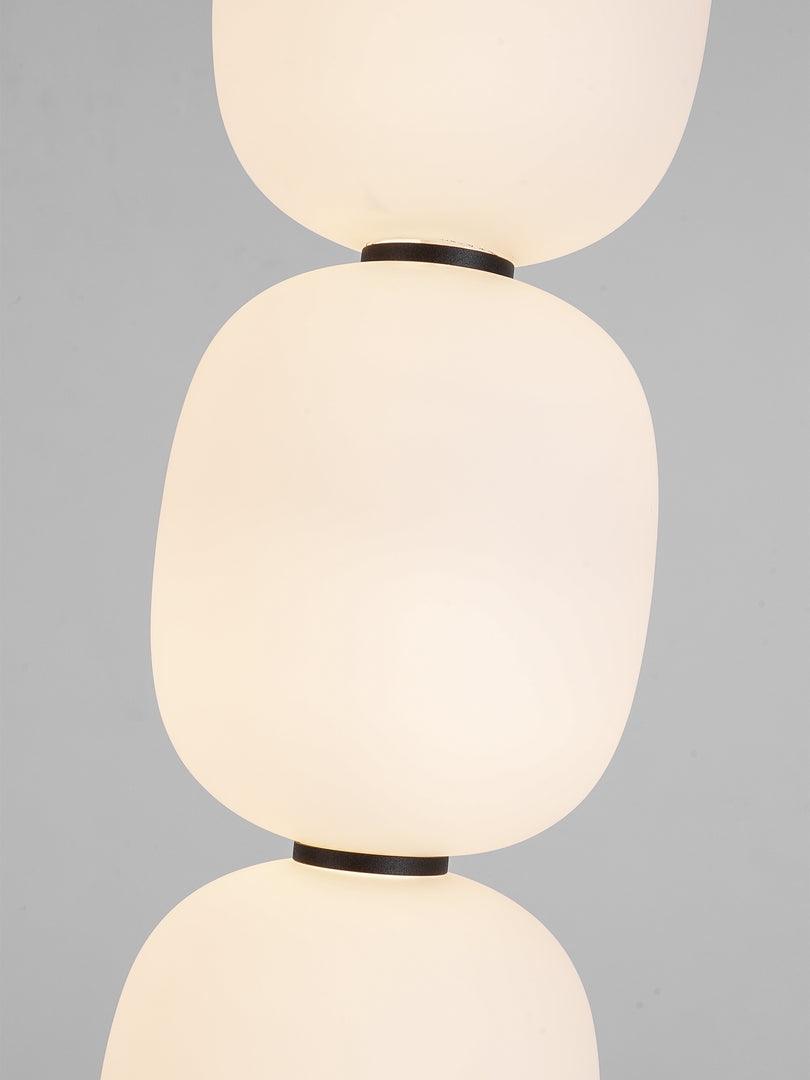 Glowing glass globes and dark separators