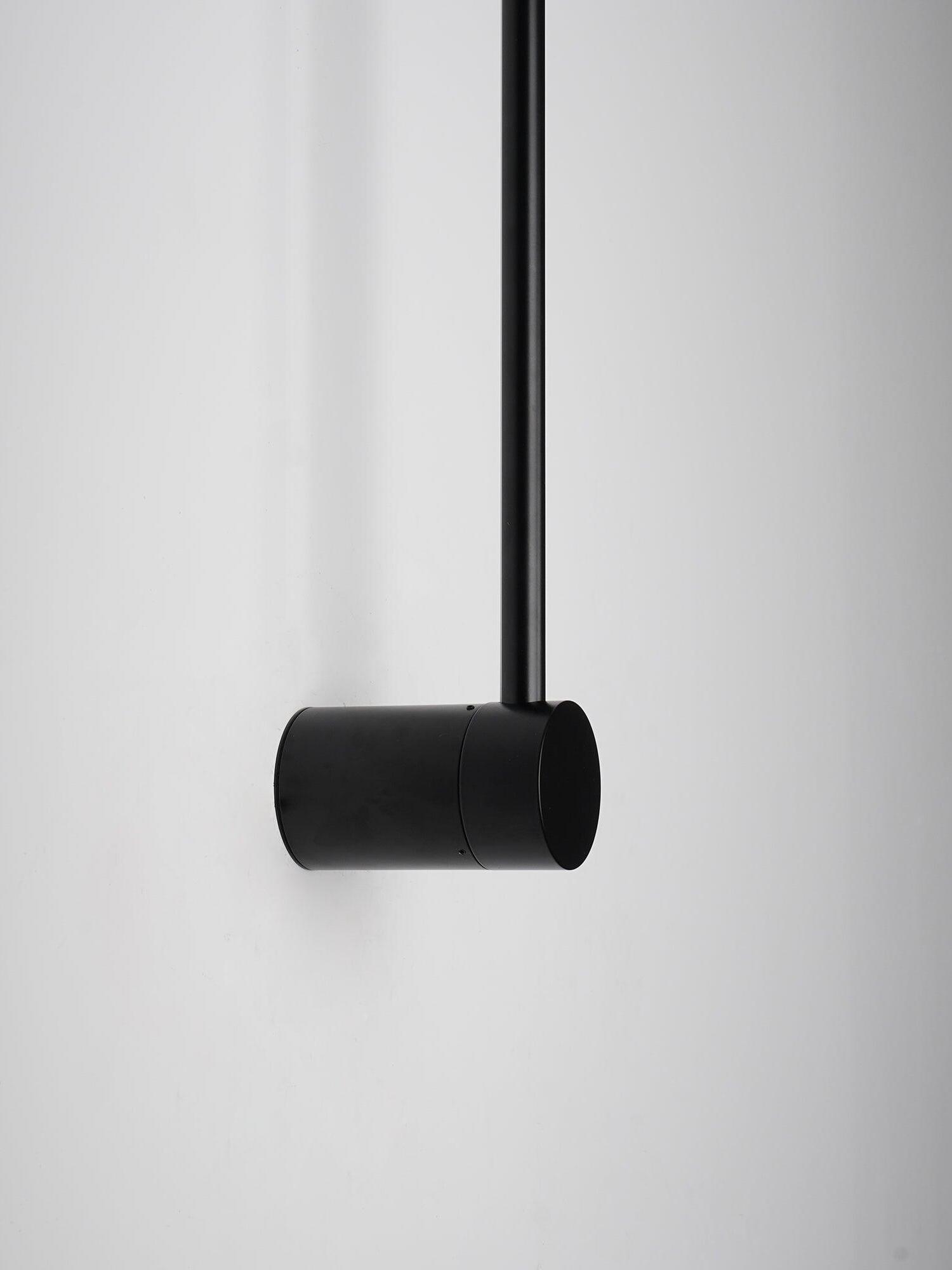 Close-up of the rod entering the cylindrical mount