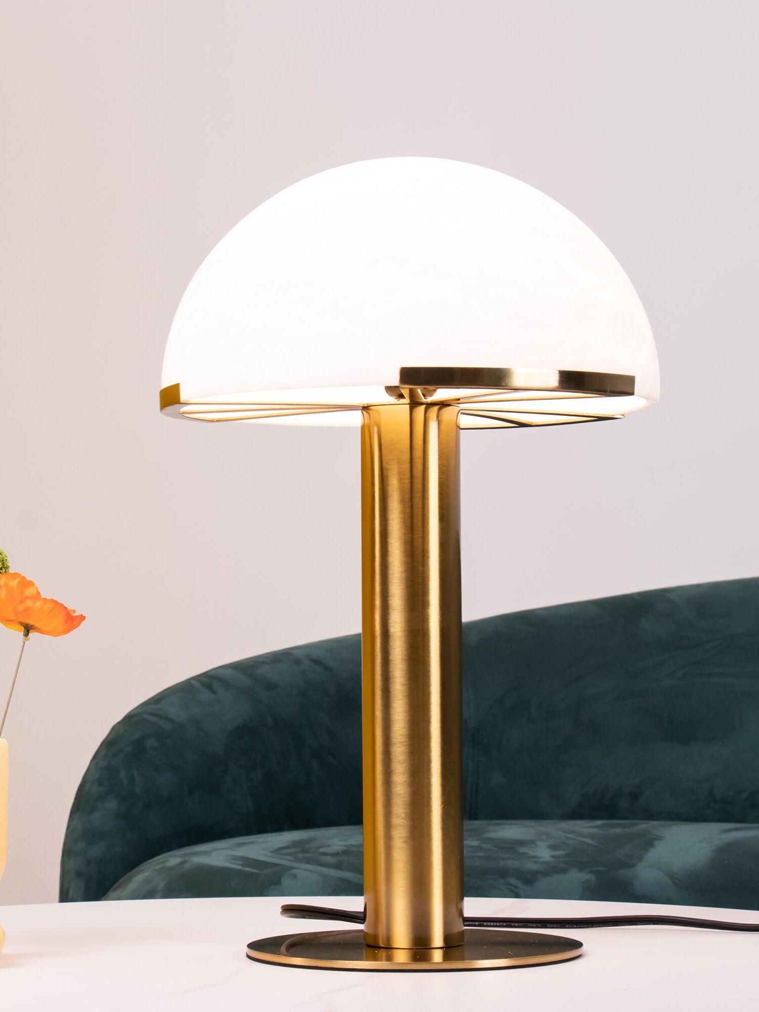 Gold dome lamp on a round table