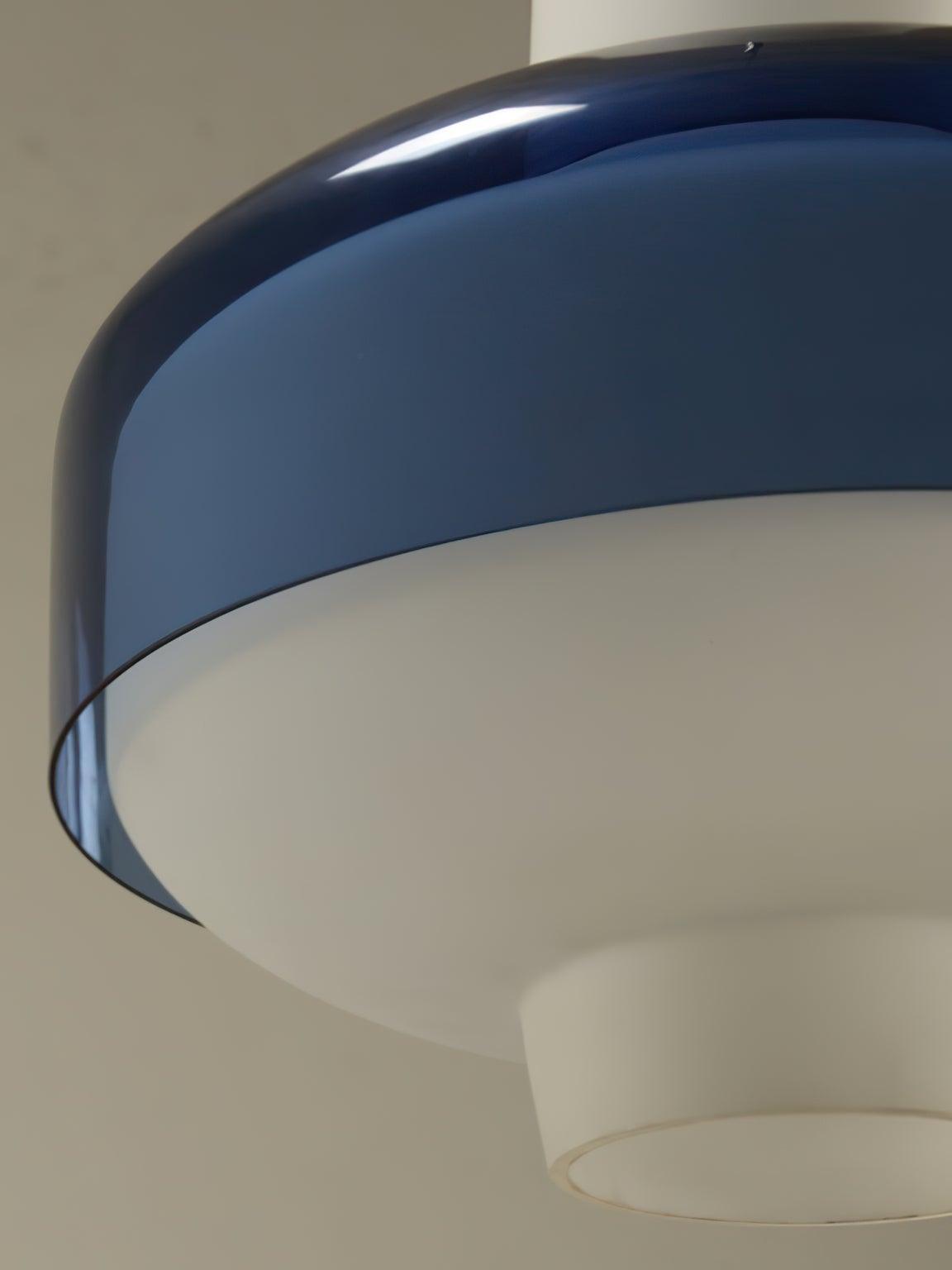 Close-up of the Trendy pendant’s white lower diffuser and projecting bottom detail.