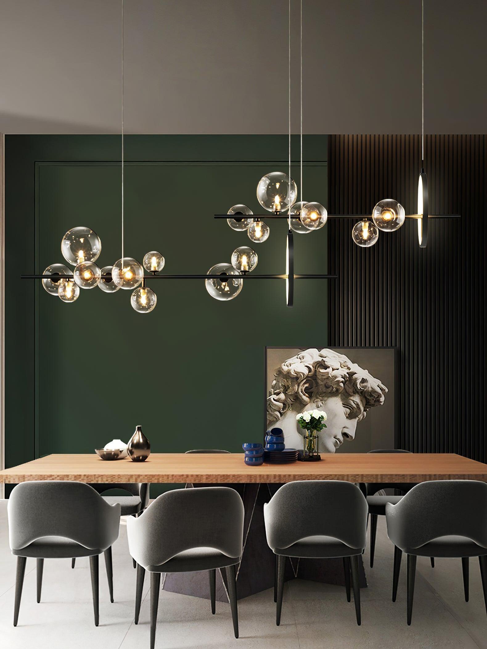 Glass globe fixture above a long dining table