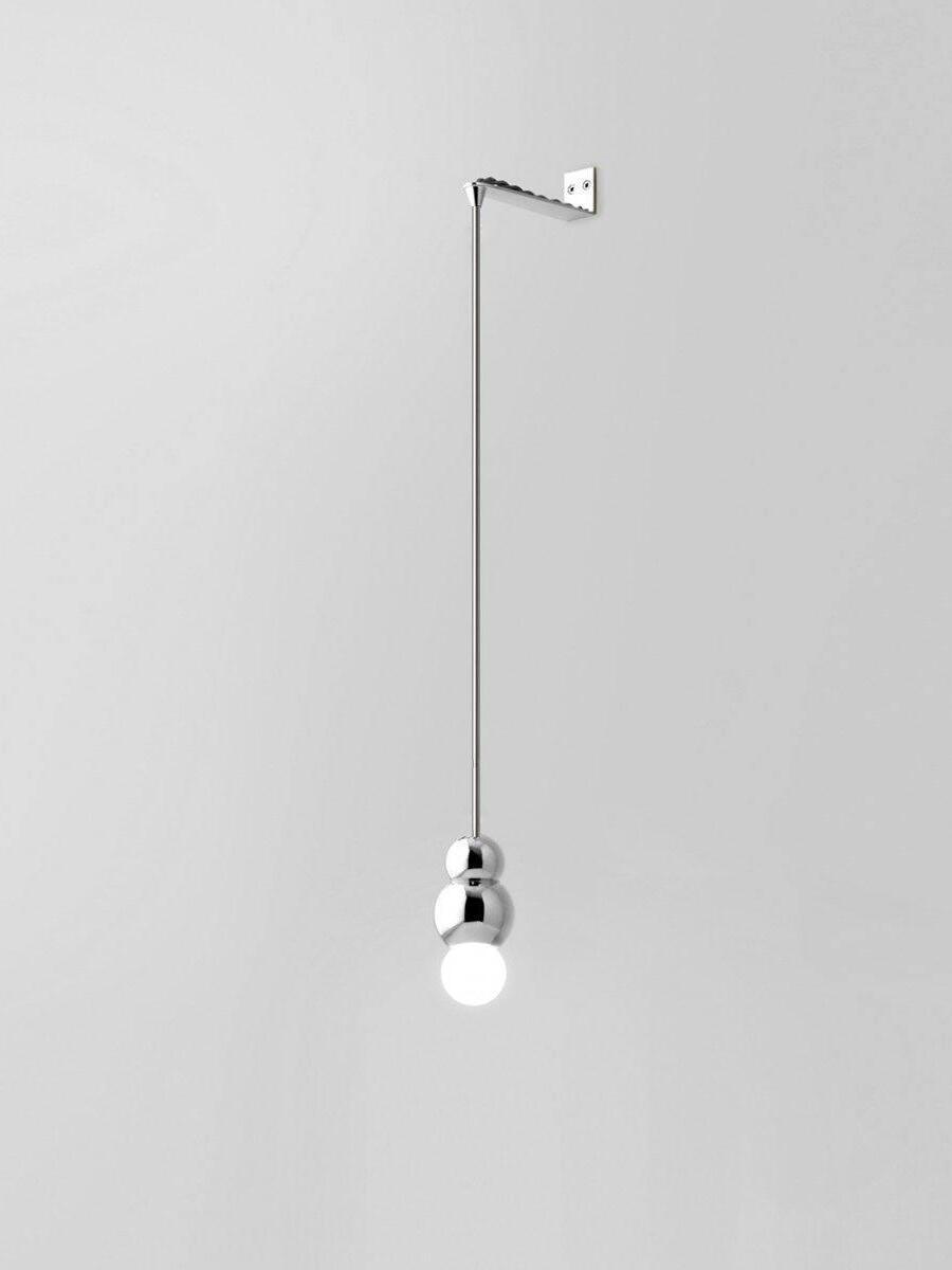 Chrome Rod wall light with small visible bulb