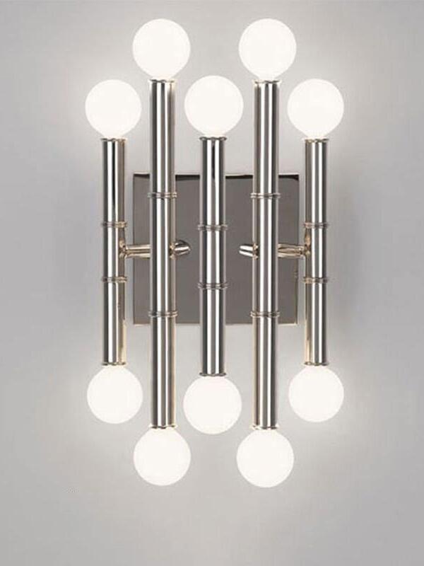 Chrome Meurice isolated against gray, showing five staggered silver stems and ten glowing white globes