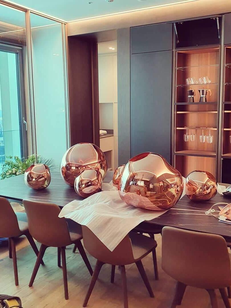Rounded reflective shades displayed on a table