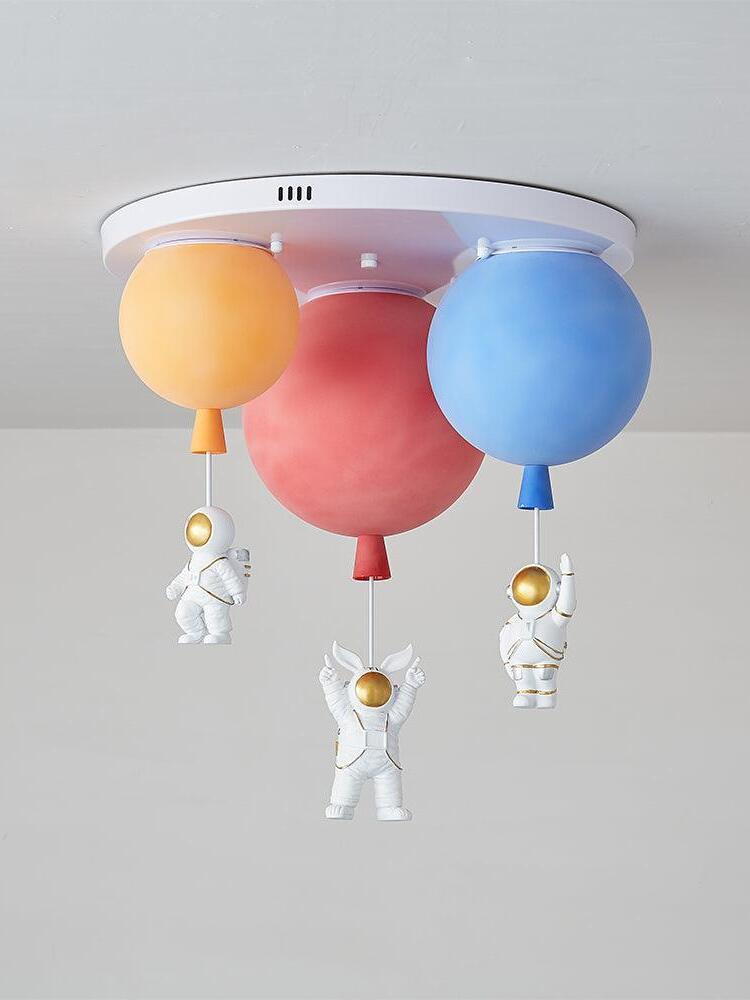 Orange red and blue three-balloon fixture unlit