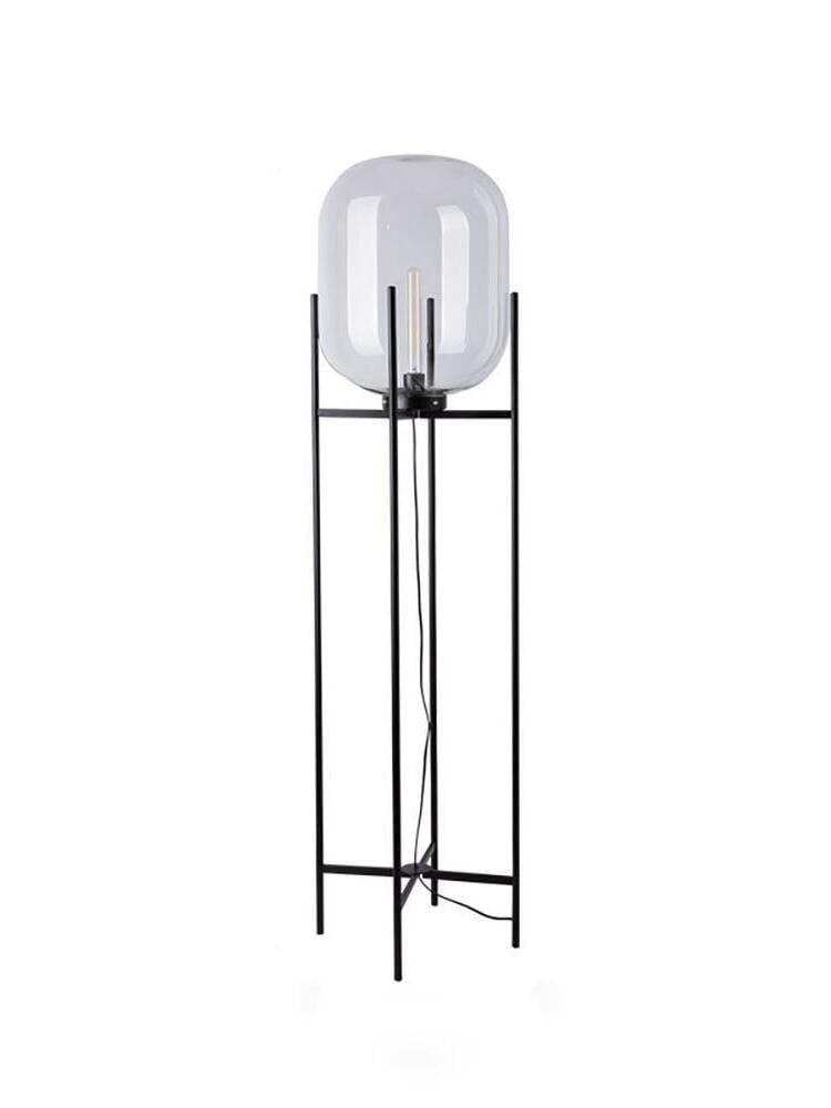 Transparent Oda glass floor lamp with visible inner bulb holder and black frame.