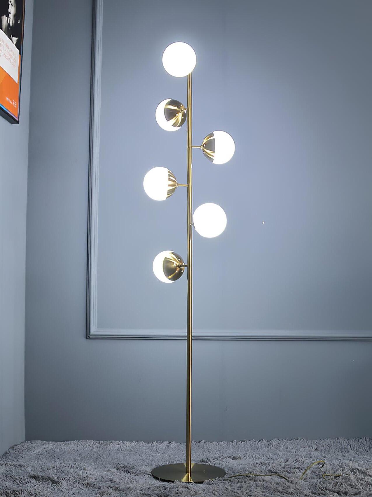 Tall gold globe lamp with round floor base