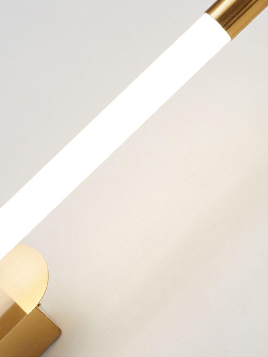 Close-up of a white Agnes tube and gold-finish end cap