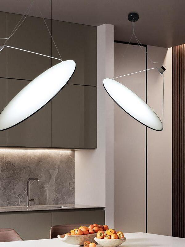 Two circular disc lights in an indoor counter scene