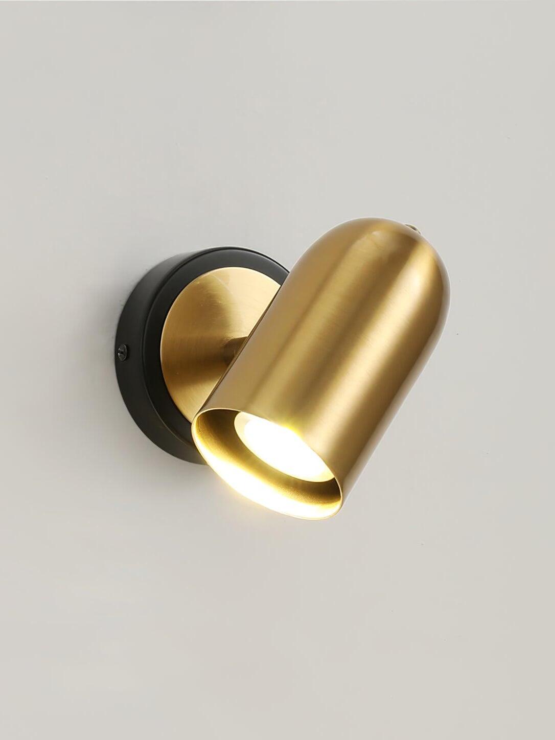 Gold cylindrical wall head tilted down from round plate