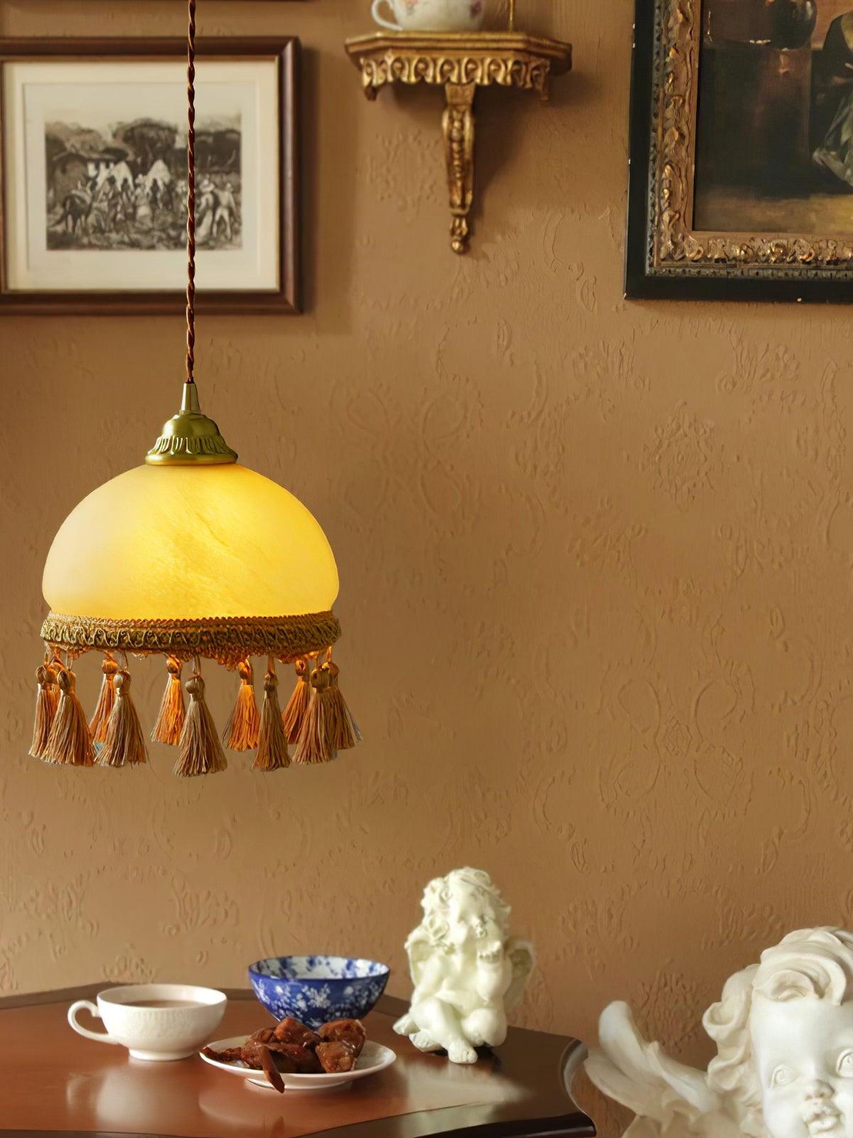 Tassel pendant over tea table in vintage room