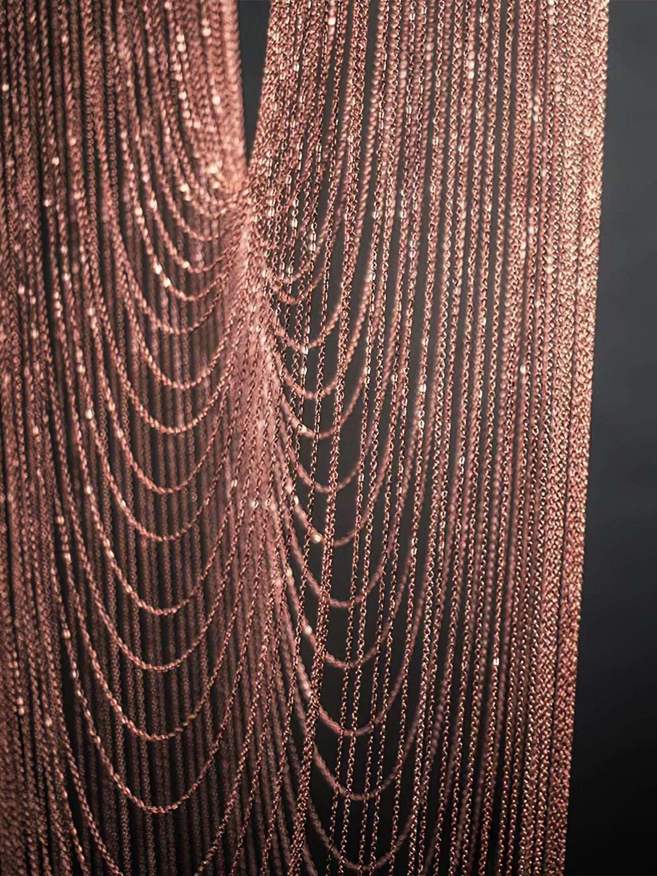 Fine chain strands hanging in nested curves