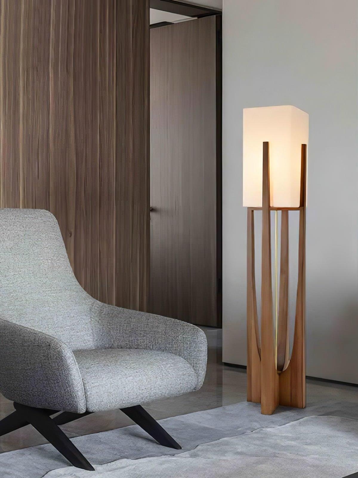 Tall lamp beside grey chair