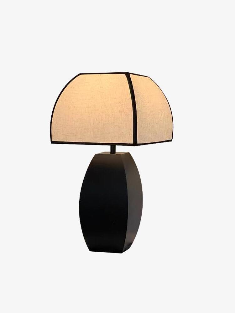 Javier table lamp with pale fabric shade edged in black