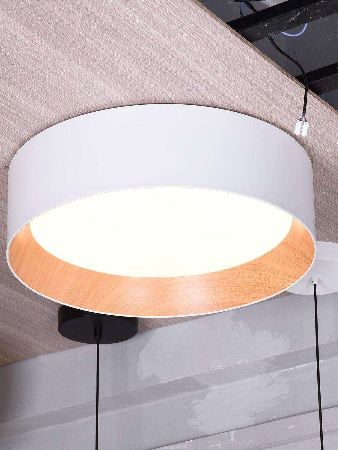 White round ceiling light with wood-look interior