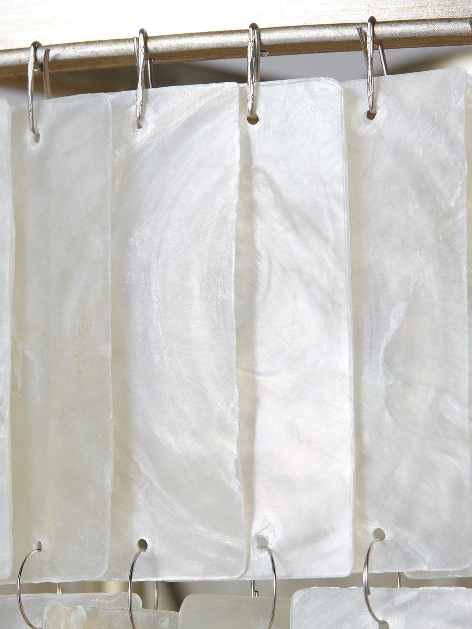 Small hanging loops joining the shell pieces
