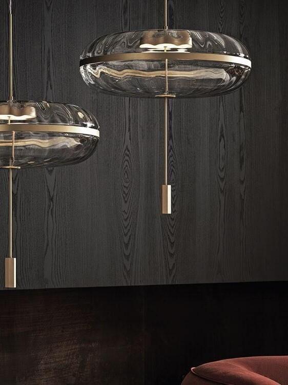 Glass pendants in a dark-panelled interior