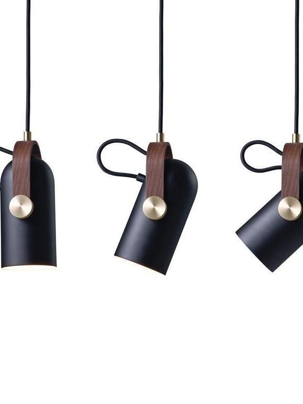 Three black pendant heads shown vertical and at two tilts, with wood brackets, round pivots and looped cables