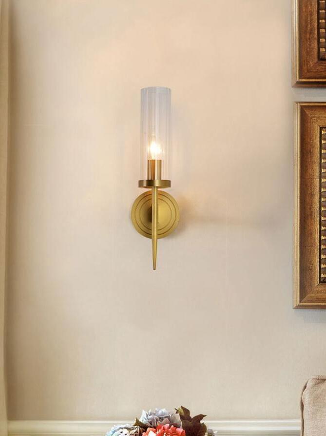 Single candle-style lamp near a framed picture