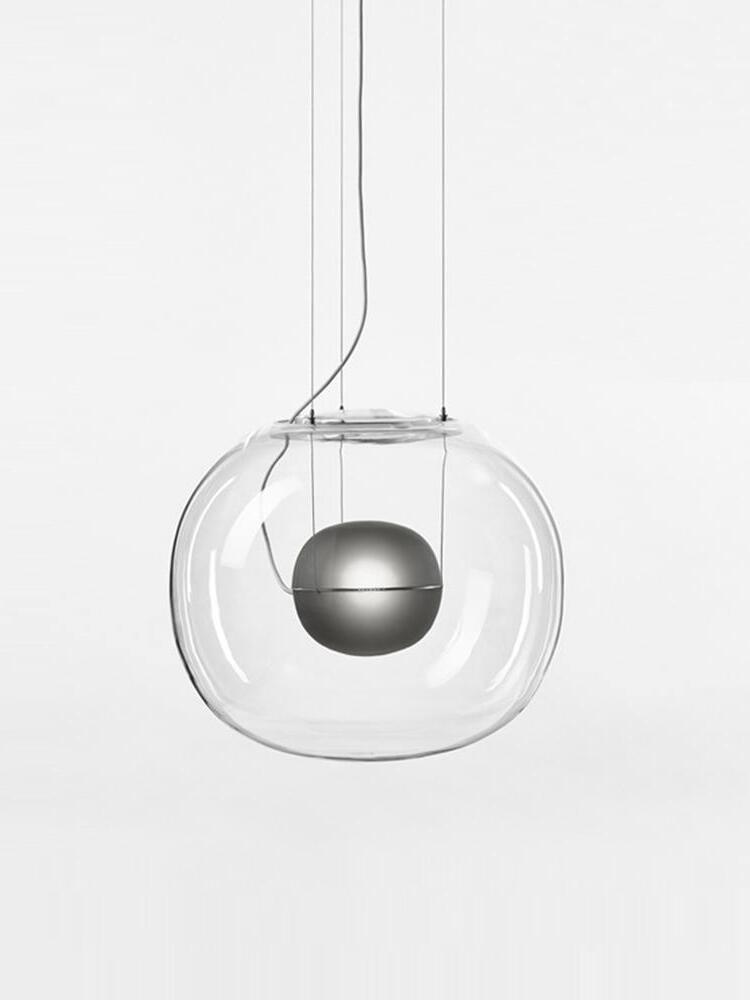 Grey inner sphere supported by fine wires within a clear glass shade