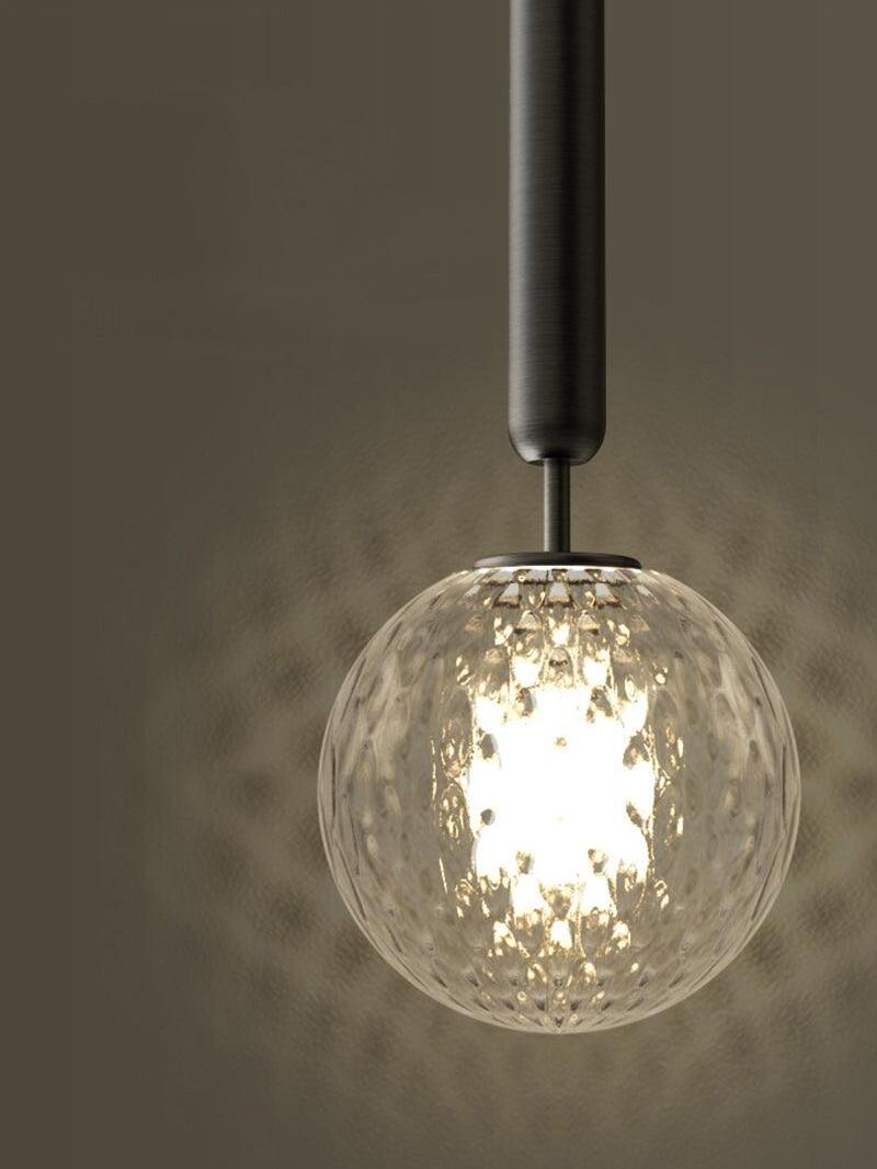 Textured Clear globe and black stem close-up