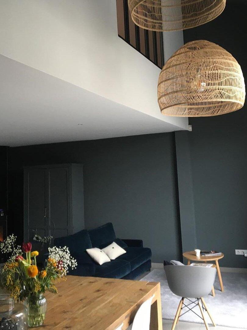 Natural woven shade above a living area