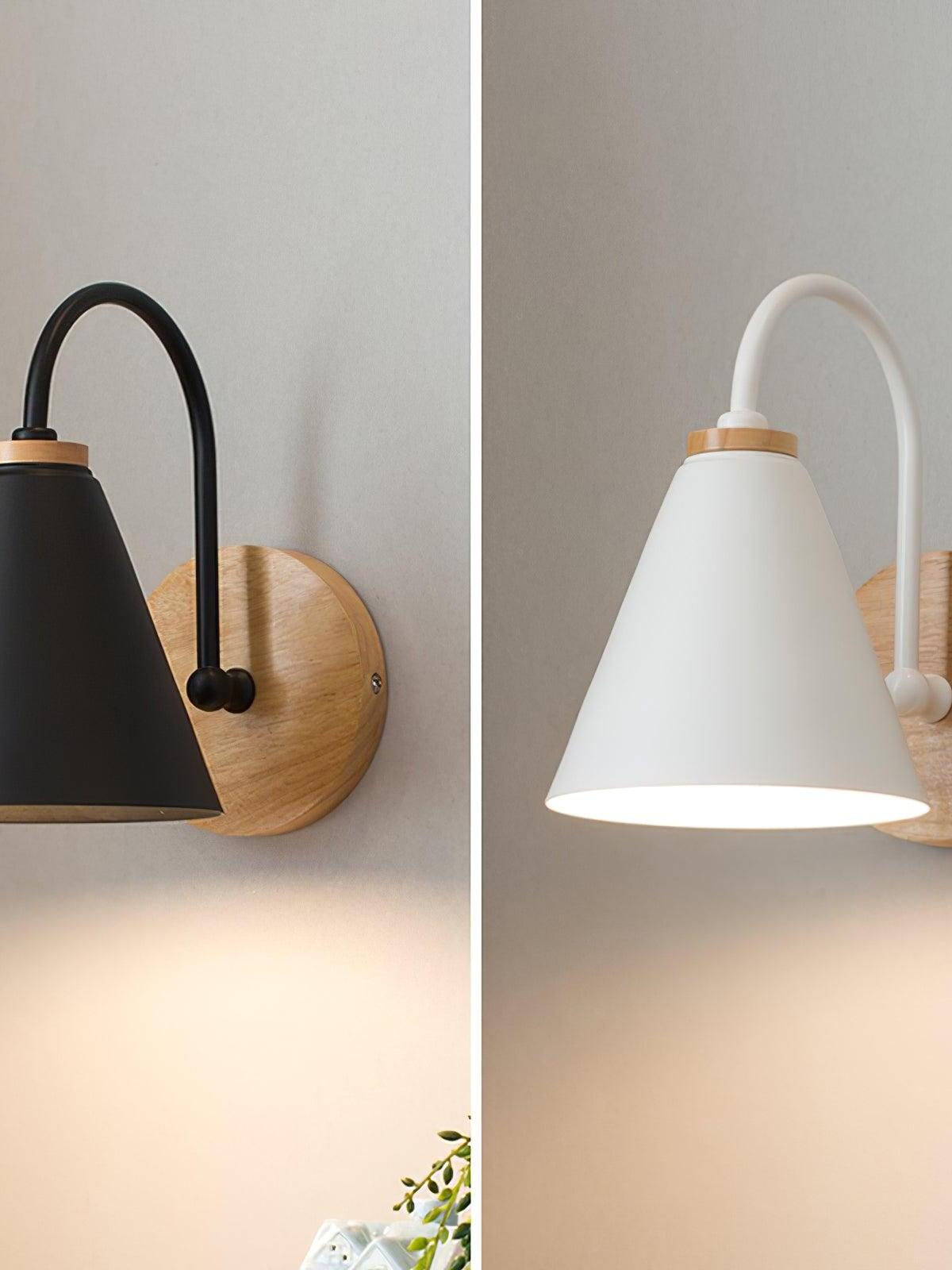 Black and white Kona wall lamp finishes shown side by side