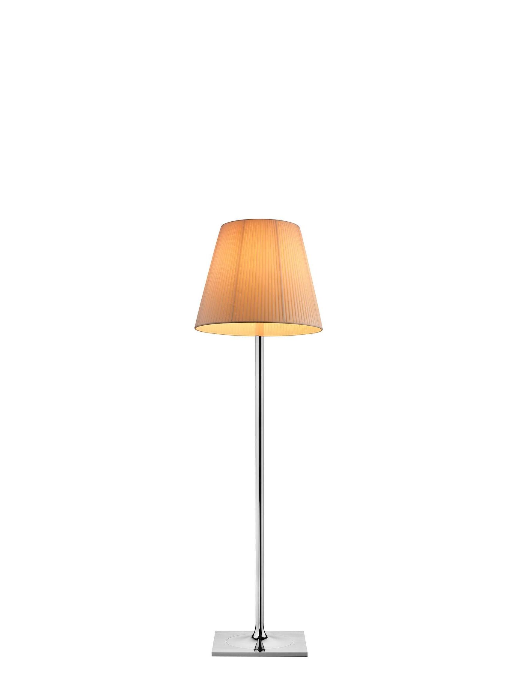 Ktribe floor lamp photographed with an illuminated warm-looking shade