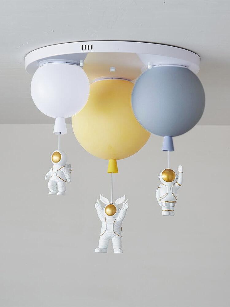 White grey and yellow three-balloon arrangement