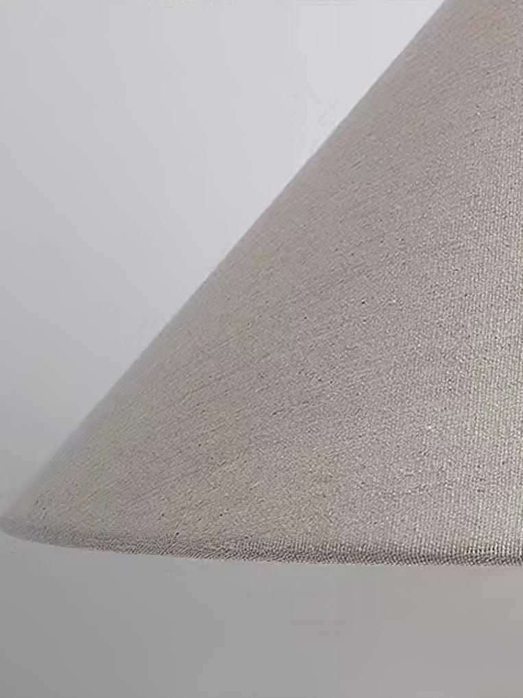 Close view of woven pale fabric lampshade