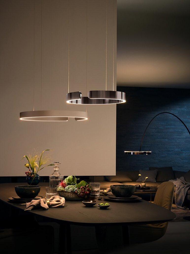 Two ring pendants above a dining table