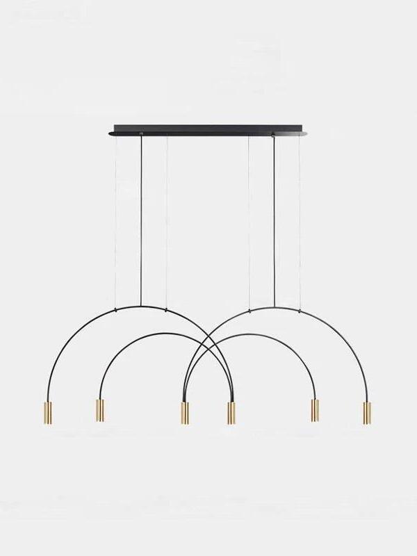 Six gold light heads arranged on overlapping black arches