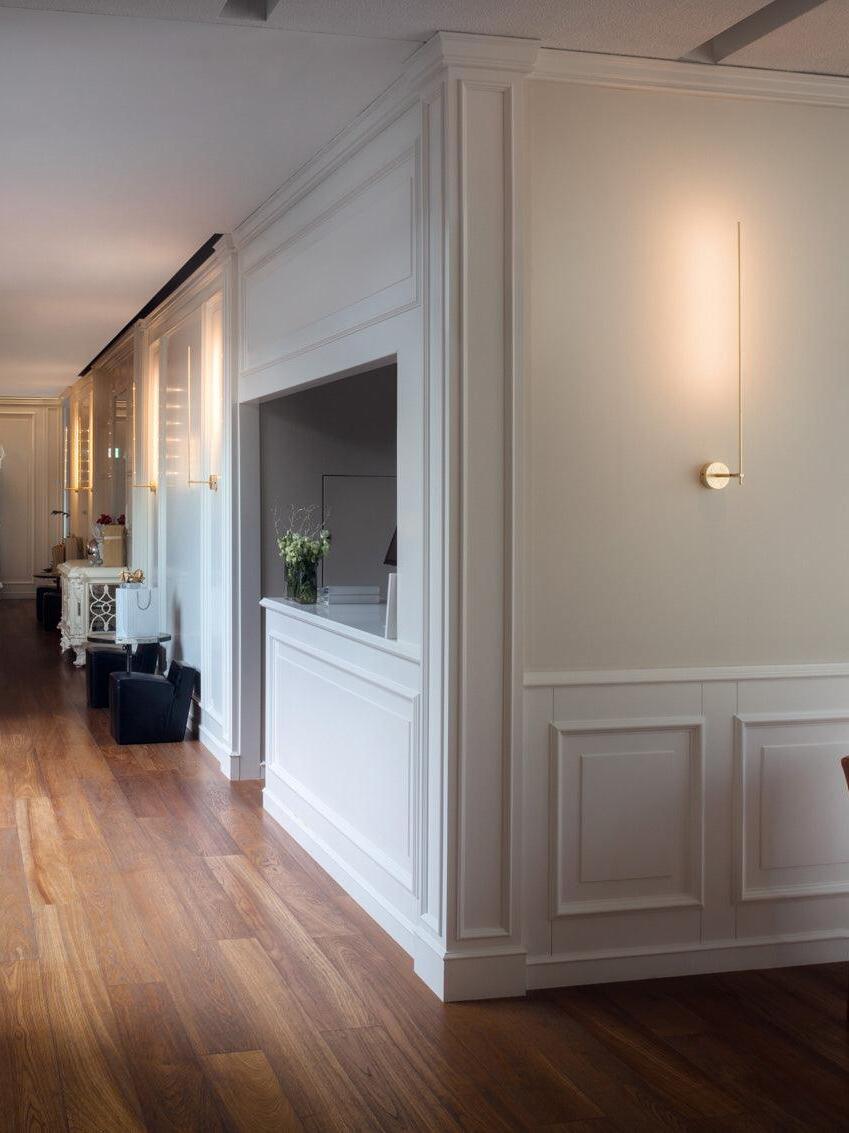 Vertical Light Stick V in a corridor
