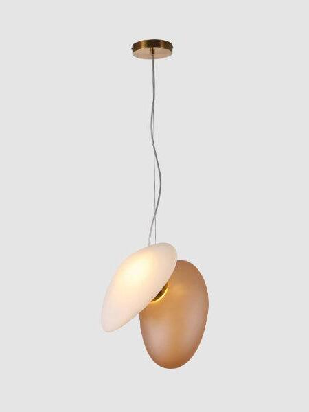 Model 19 white and amber pebble pendant on pale background