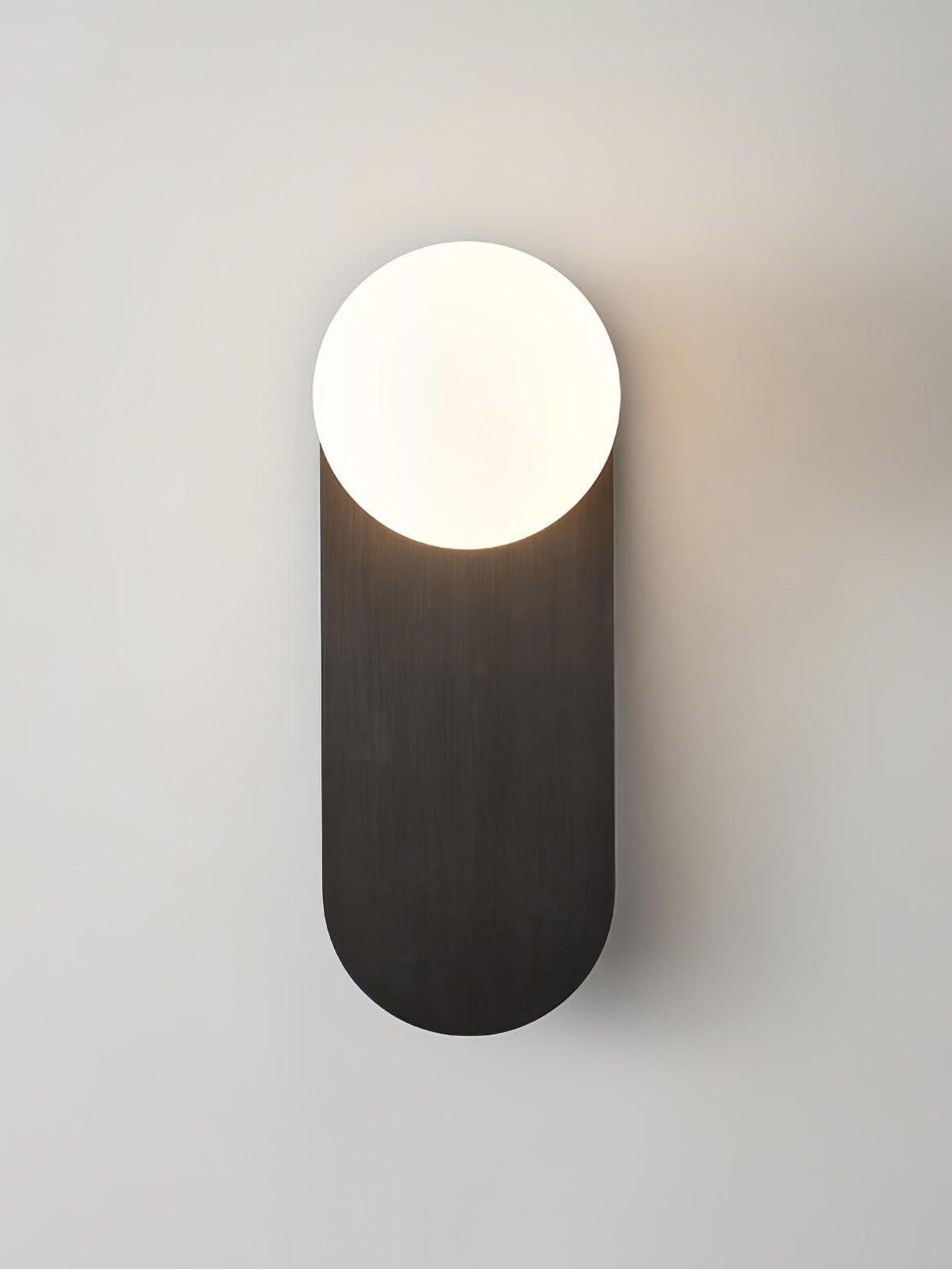 Front view of White globe and rounded-end dark plate