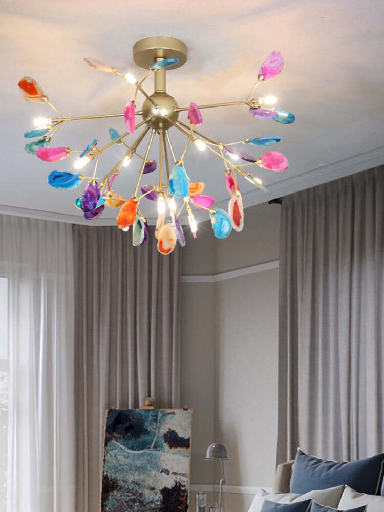 Ceiling-near radial chandelier with multicoloured stones