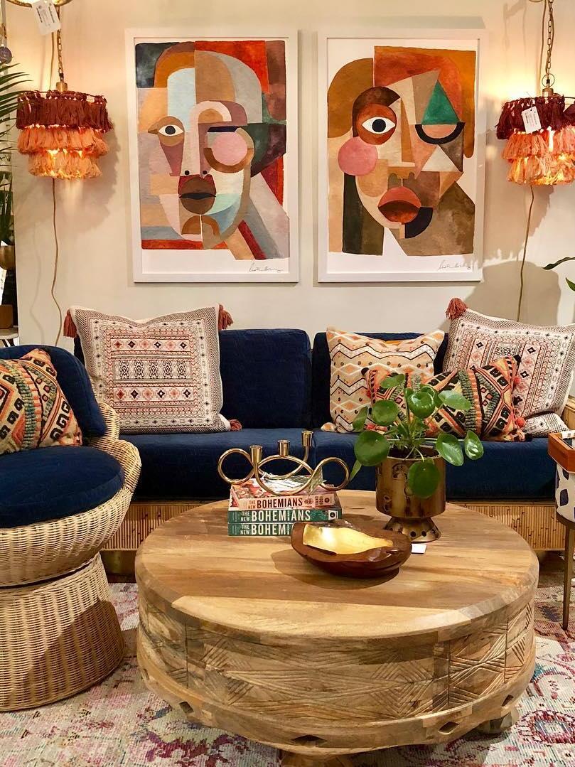 Multicolour shades above a sofa and artwork